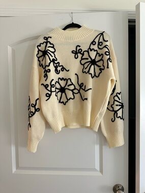 Vici Cream Turtleneck Sweater with Black Floral Outline